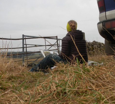 Esther Tyson drawing in a field